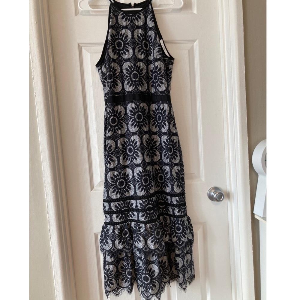 Fitted black and white lace dress
